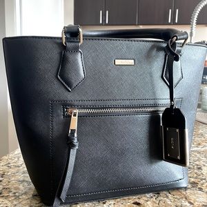 Black small tote. Great size for the office and going out. No scratches